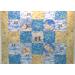 Beige Winter Pals baby quilt close up